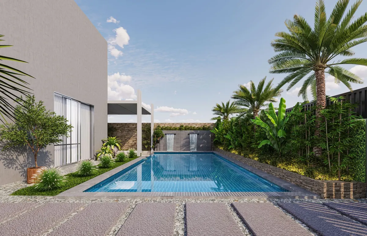 A villa courtyard pool framed by tropical planting